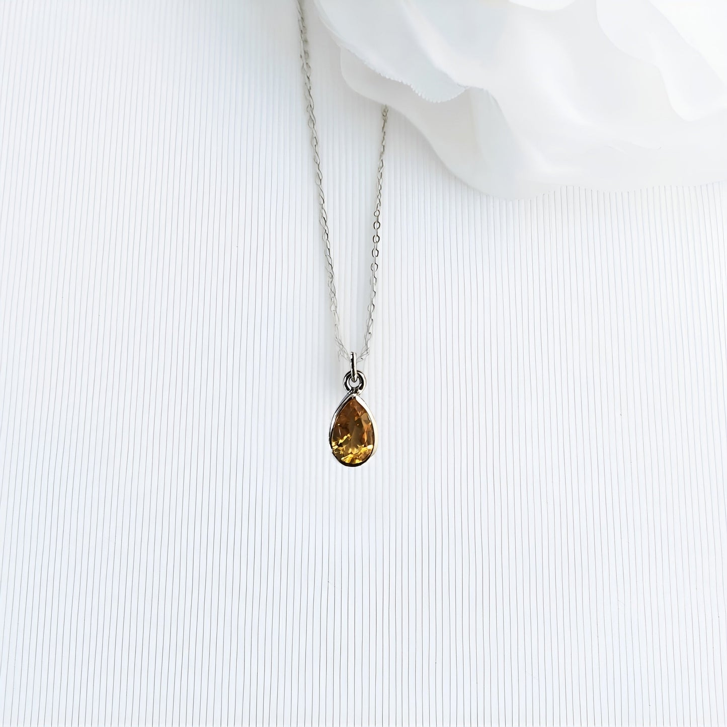 Silver pear shaped citrine pendant